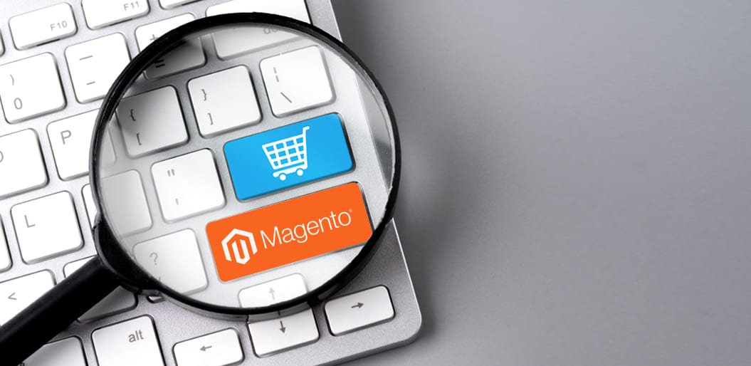 Magnifier magnifying the keys with a shopping cart and Magento